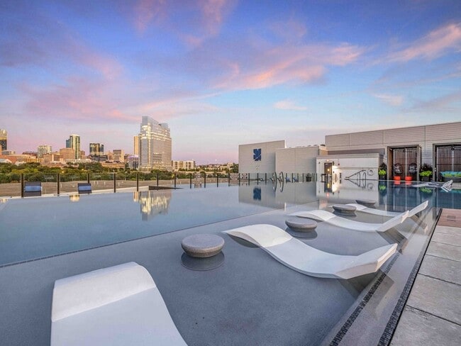North Building Rooftop Infinity Pool with Outdoor Lounge and Cabanas - Bexley at Left Bank