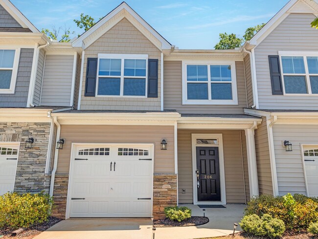 Building Photo - Spacious 3 Bed / 2.5 Bath Townhouse with Loft & 1-Car Garage