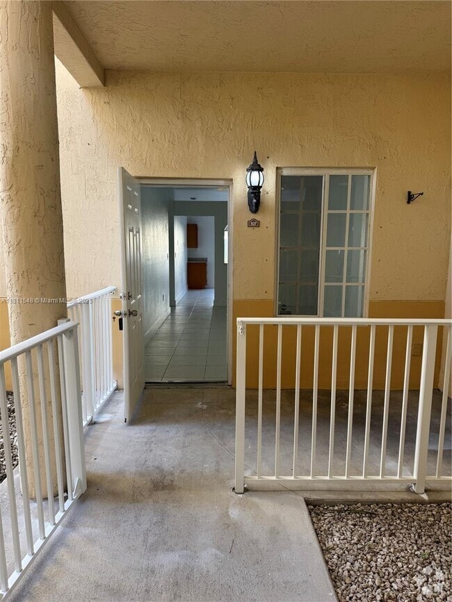 Building Photo - 6912 NW 179th St Unit 107-3 Rental