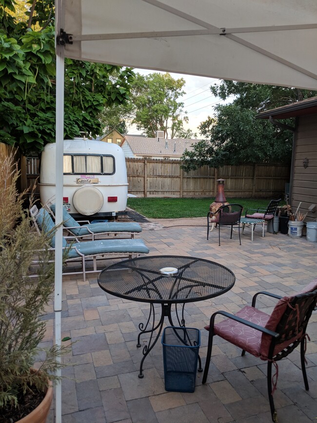 Enjoyable back patio seating to be shared by all. - 229 E Ottley Ave House