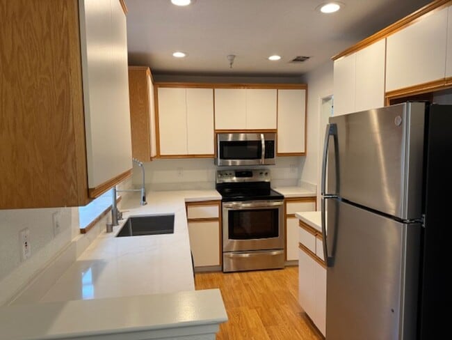 Photo - Wonderful 2 story condo in Ashford Ct-Detached 1 car garage, both bedrooms with attached bathroom... Unit 204