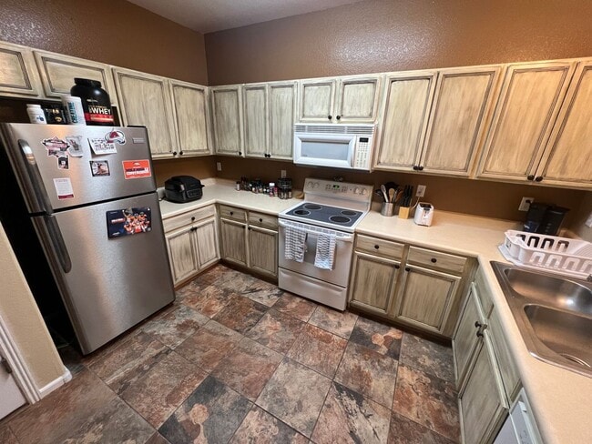 Photo - Beautiful Ridgeview at Stetson Hills Townhome Near Powers Corridor Amenities with a 2 Car Garage!