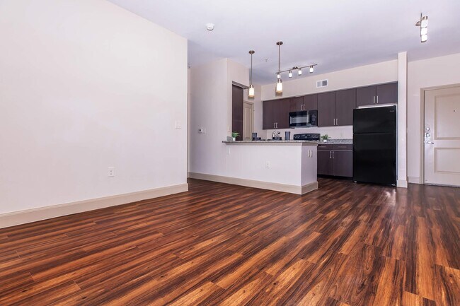 Building Photo - Bright Rooms, Brighter Savings Unit AX2