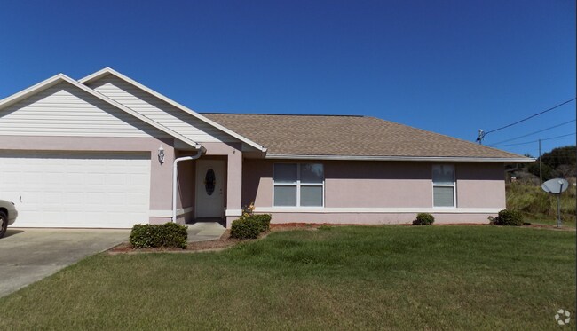 Building Photo - 3/2/2 Beautiful Home with Spacious Backyar...