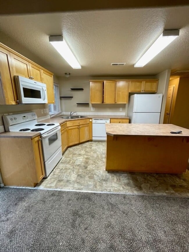 Photo - Single level home in Foxborough! Fenced yard!  A/C and a gas fireplace!