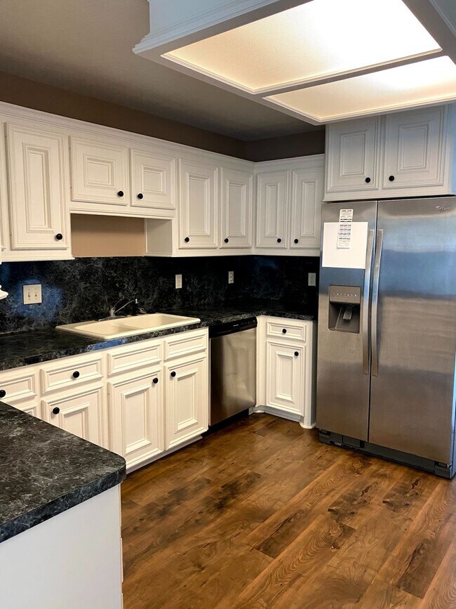 Photo - FABULOUS THREE BEDROOM HOME WITH LARGE DECK, FIREPLACE AND FLEX ROOM