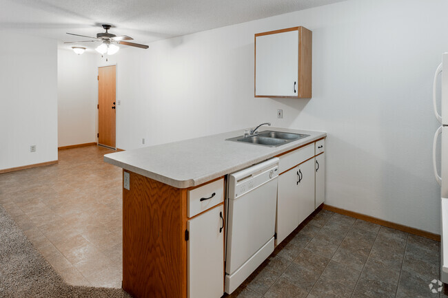 2BR, 1BA - 696SF - Kitchen - Paris Place Apartments