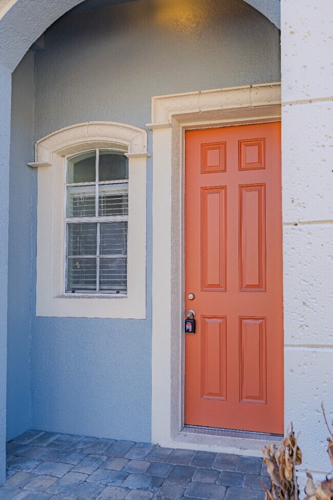 Photo - Modern 3-Bed Townhome with Garage & Patio in Casselberry – In-Unit Laundry, Central AC!
