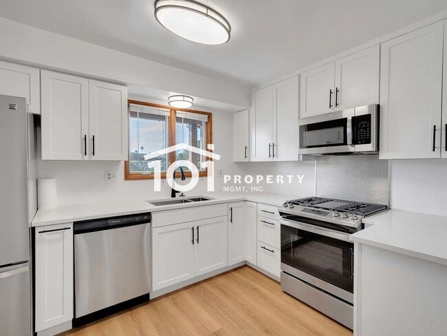 Photo - Spacious 4-Bedroom Home with 3 Bathrooms and a 2-Car Garage