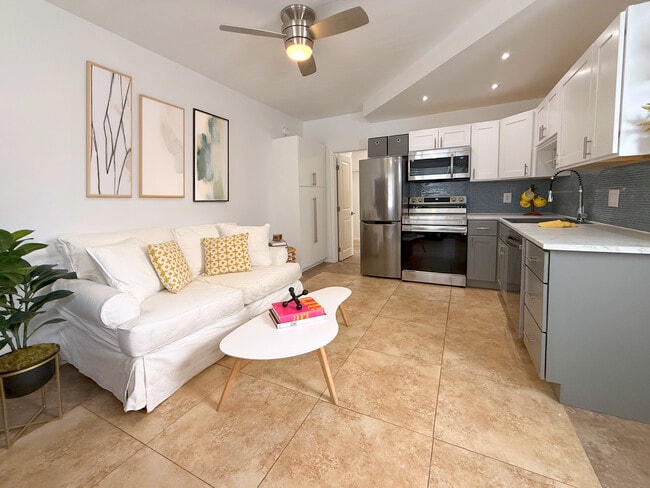 Living Room and Kitchen. Area is big enough for a breakfast nook - 630 NE 37th St Apartments