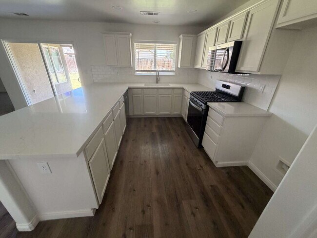 Photo - Beautifully Remodeled 4 Bed, 2 Bath Home with Spacious Backyard!