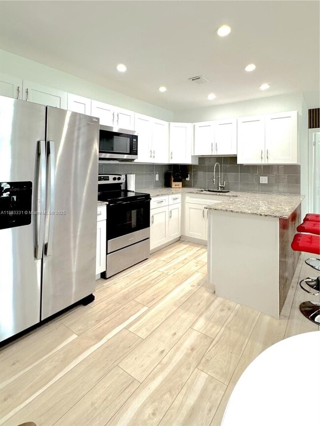 Photo - 120 NE 9th Ave Unidad 120A