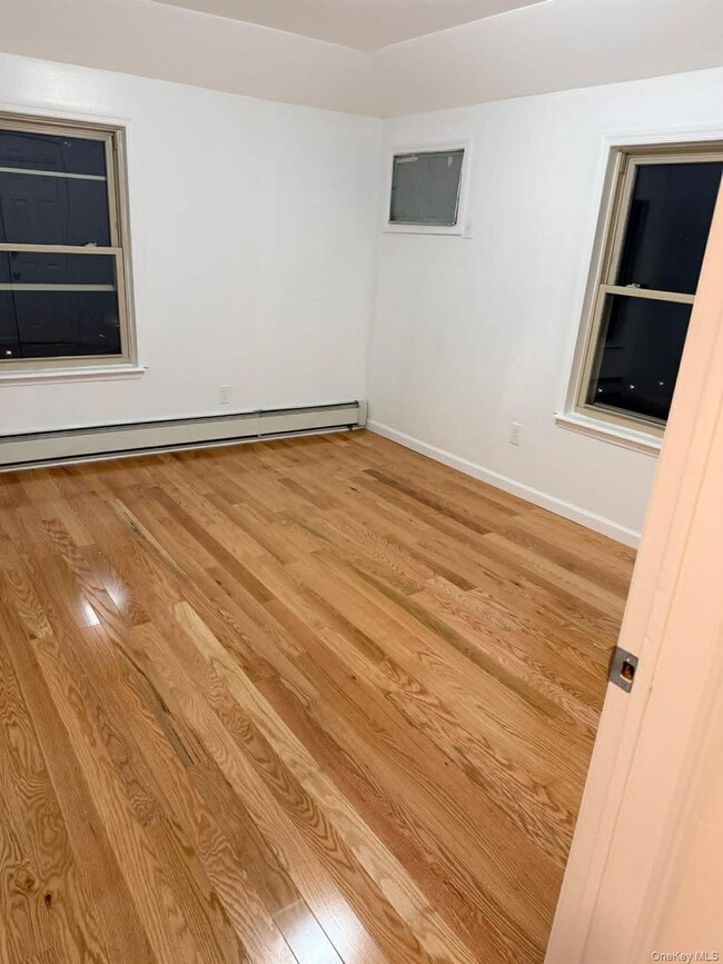 Building Photo - 128-13 145th St Unit 2