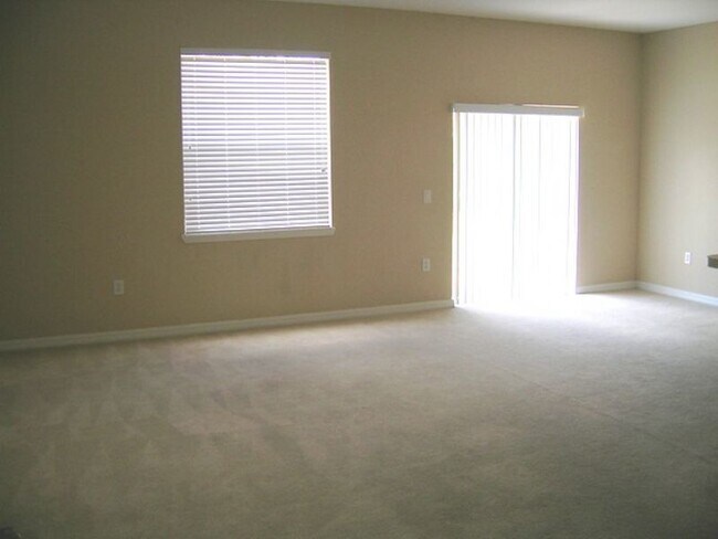Freshly Painted 3-Bedroom Townhome with Garage and Driveway Parking, in St. Cloud, Florida