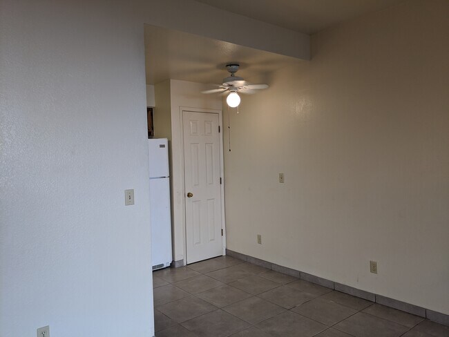 Ceiling fan/light over dining area. - 5750 N Camino Esplendora Unit 120 Building A