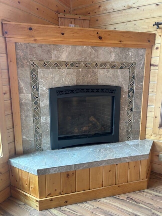 Photo - Gorgeous Log Home with infloor heat.  Two level lots with RV parking and dumpstation.
