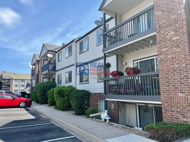 Building Photo - 10784 W 63rd Pl Unit 103 Rental