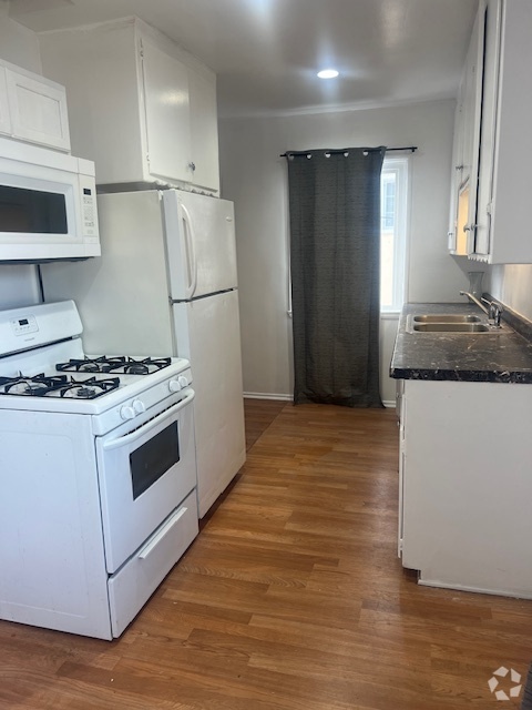 Kitchen w gas range dual stainless sink & refrigerator - 4023 McLaughlin Ave Rental