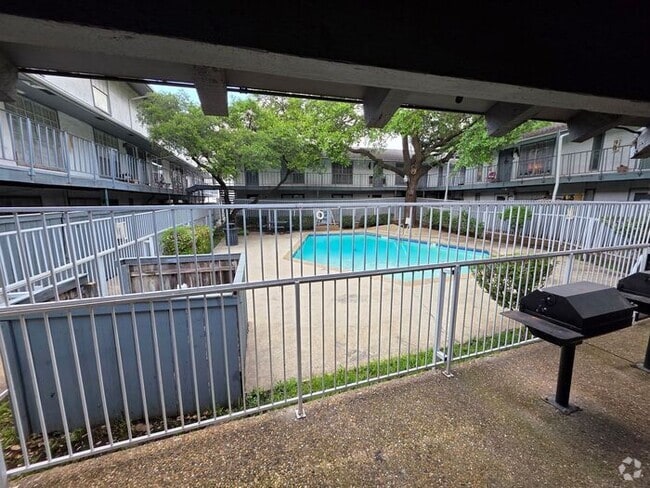 Building Photo - Updated 1-Bedroom Condo Near Pool Ready fo... Unit Bldg C 162