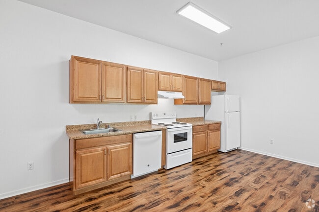 1BR, 1BA - 679SF - Kitchen - College Villas - 55+ Senior Community