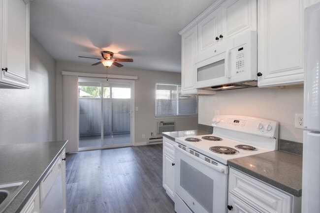 View from kitchen area through the enclosed patio - Four Twenty Union Apartments
