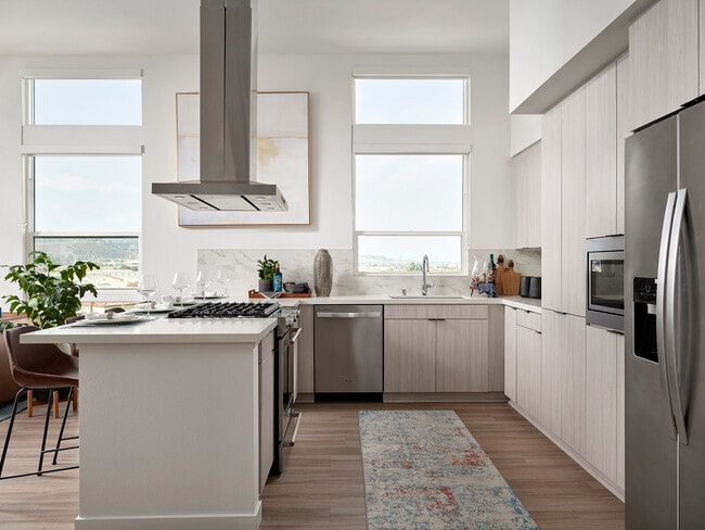B934: Kitchen with white cabinets