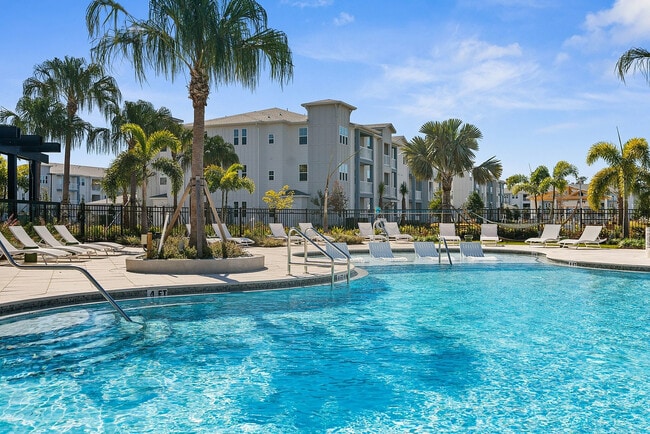 Relax in style at our tropical-inspired pool area, the perfect spot for leisure and luxury living.