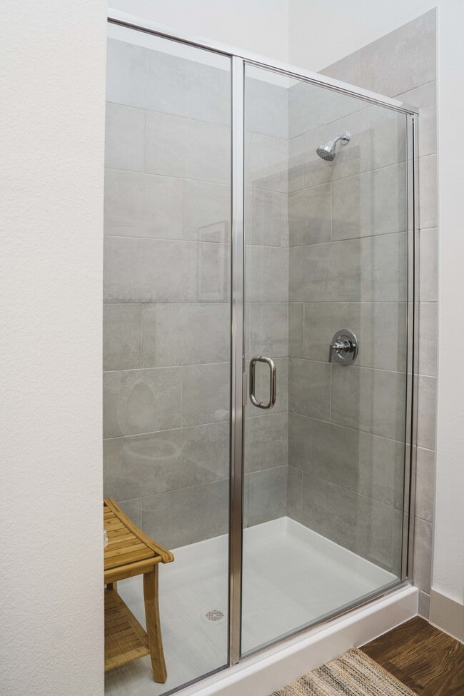 Showers with floor-to-ceiling tile surrounds