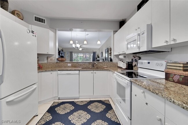 Building Photo - 7823 Regal Heron Cir Unit 105