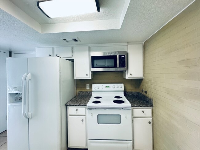 Building Photo - 11311 Harwin Dr. Unit 25