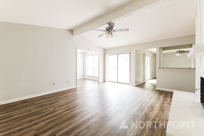 Photo - 3 BR/2BA | Newly Renovated Single Family Home | Fireplace in living room | Fenced backyard!