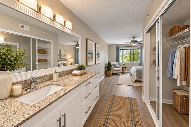 Elevate your living experience at Manatee Bay with this elegantly designed bathroom featuring modern fixtures and a spacious layout. Enjoy natural light and serene views that create the perfect retreat. Schedule your tour today!