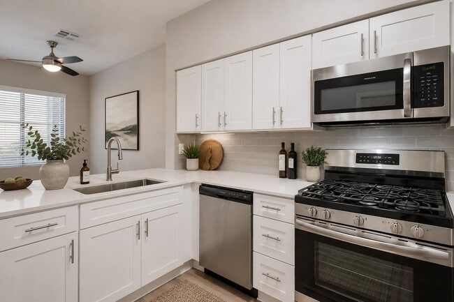 Step into the modern elegance of Willowbrook's kitchen, featuring stainless steel appliances and sleek cabinetry for enhanced functionality. With a perfect blend of style and practicality, this space is ideal for culinary creativity. Explore your new home today!