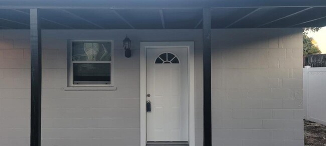 Building Photo - 1411 E 24th Ave Unit b