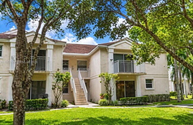 Building Photo - 11216 SW 12th St Unit 203