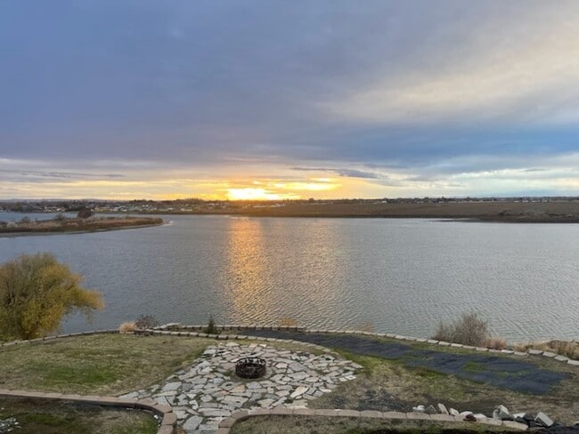 Photo - Waterfront! Sunset views! 3 bdrms! Attached garage! Private driveway!