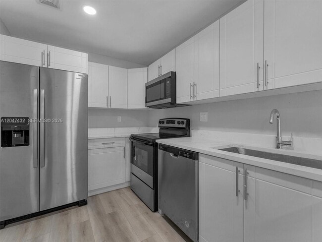 Building Photo - 10373 NW 35th St Unit 10373