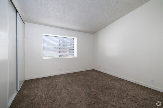 2BR, 1.5BA - 1,100SF - Primary Bedroom