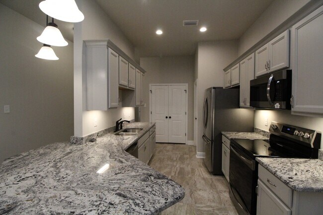 Photo - Spacious 3BR/2BA Home Near Navy Federal HQ with Split Floor Plan, High Ceilings & 2-Car Garage
