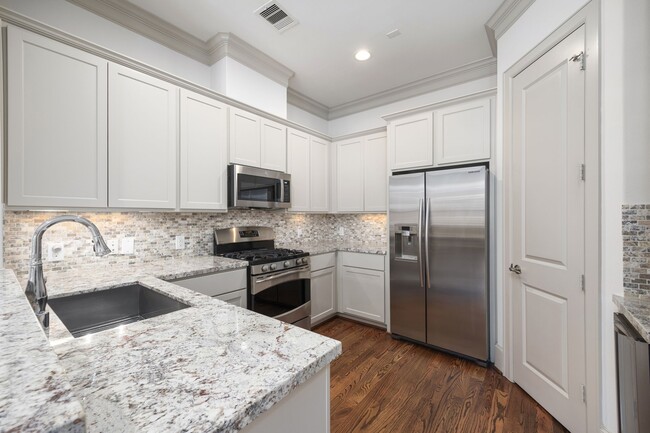 Building Photo - 3302 Audley St Unit 125