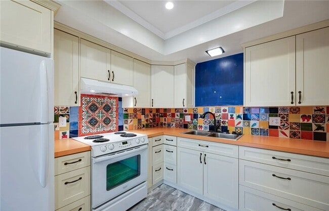 Photo - Updated 1-Bedroom Condo with Garage, Pool & Patio in Prime Fullerton Location Unit 26D