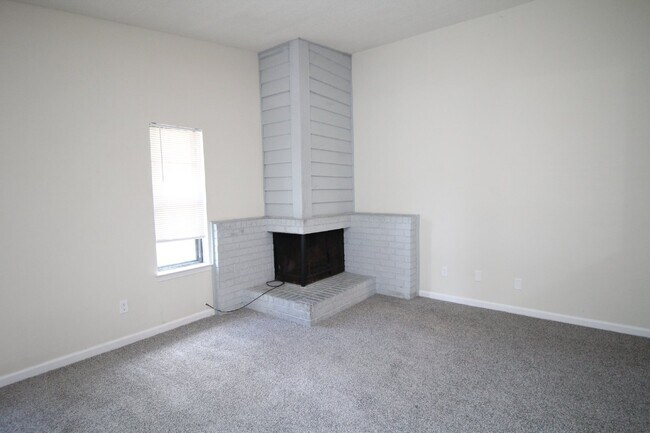 Photo - Modern 3BR/2BA Duplex with Open Layout, Fireplace, Fenced Backyard & Updated Kitchen in North Pen...