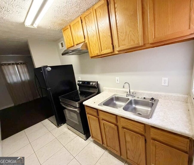 Building Photo - 420 Rawson St SW Unit APT 3