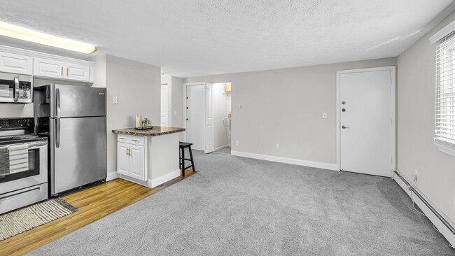 Our Spacious Living Rooms with Breakfast Bars and Kitchen Access Create a Social Sanctuary! - Edgewood Court