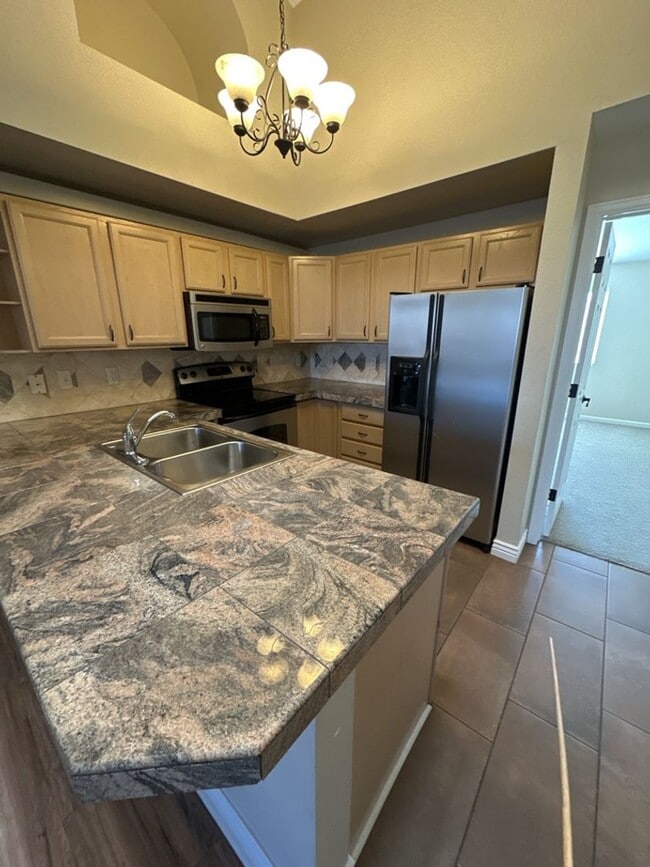 Building Photo - 2800 W Centennial Dr Unit F