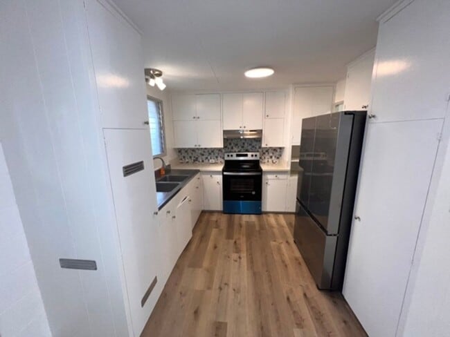 Photo - 5 Bedrooms | 2 Bathrooms | 3-Car Carport |...