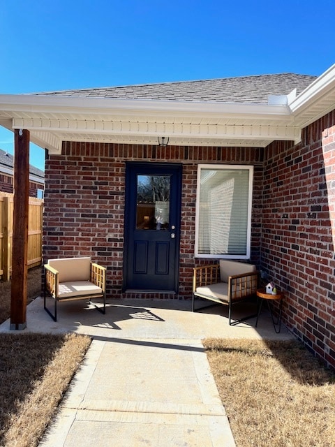 Covered back porch overlooks small privacy fenced backyard. - 2488 N Raven Ln Unit 2488 N Raven Lane