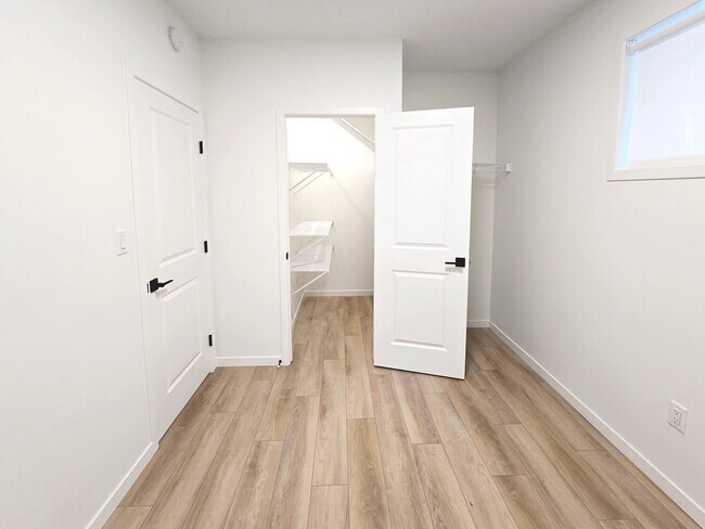 Photo - 11919-11955 55 St NW Unit BSMT 2