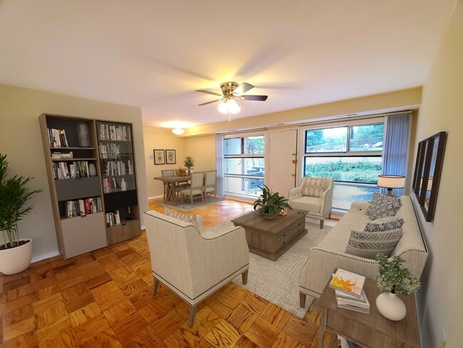 Spacious living room with floor-to-ceiling windows in every unit
