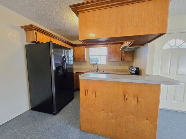 Photo - Quaint 2BD/1BTH apartment with a big back ...